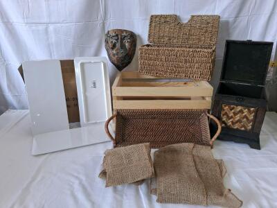 Assorted Decorative Storage Lot: Ceramic Mask, Wicker Baskets, Wooden Crate, Platters, Burlap