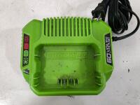 Assortment Of Household Items And Tools: Working Box Fan, Brabantia 1.32-Gallon Trash Can, Greenworks Charger - 14