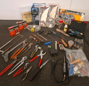 Hand Tools, Chisels, Saw Blades, Soldering Kit (Powered On), RV Holding Tank Vents, And More