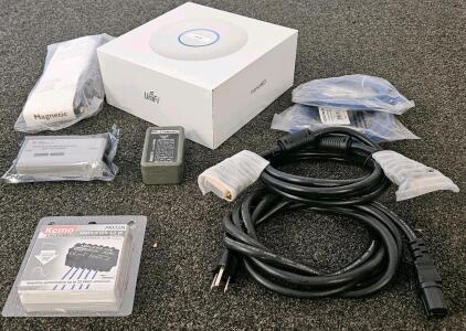 UniFi nanoHD Access Point, Kemo Amplifier, TI Debugger, Larsen Antenna, Cables, And Tester