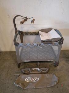 Graco Pack 'n Play Portable Playard with Bassinet and Changer, Brown and Blue Plaid