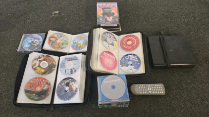 Large DVD Movie Collection (35+) w/ Generic DVD Player, Remote & Mainstays/Conductor Cases
