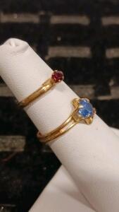 2 Gold-Tone Gemstone Solitaire Rings &ndash; Blue & Red Stones, Round Cut, Prong Set