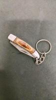 Damascus Pattern Folding Pocket Knife Keychain, Wood Handle, Clip Point Blade, Brass Pins - 3