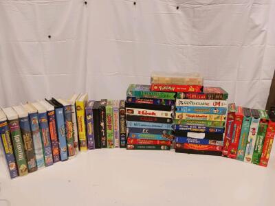 Large Lot of 33 Disney, Warner Bros, Magic School Bus, Scooby-Doo, Pok&eacute;mon, VHS Tapes + TMNT Case