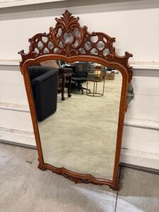 Vintage Carved Wood Wall Mirror with Ornate Crest and Scrollwork, Mid-20th Century