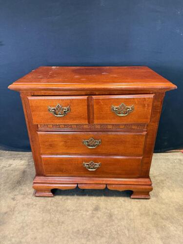 Traditional Wooden 4-Drawer Dresser with Ornate Brass Handles and Decorative Inlay