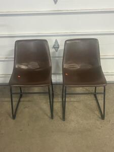 Pair of Modern Armless Side Chairs with Brown Faux Leather Seats and Black Metal Sled Bases