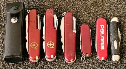 6 Multi-Tool Pocket Knives &ndash; 4 Red SAK-Style, 1 Polaris Logo, 1 Traditional Slipjoint, Leather Case