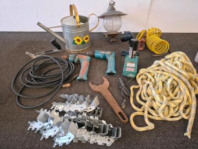Makita Drill & Charger (Powered On), Strong-Tie Brackets, Ryobi Flashlight, Tools & Hardware