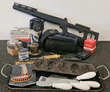 Canon DSLR EOS with Lens & Bag, Black+Decker Iron, Gerber Saw, Cast Iron Fish Pan, Mixed Lot. Electronics tested and work.
