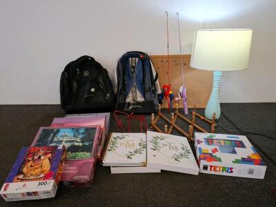 Mixed lot, household goods and back to school. Two backpacks, teal lamp( powered on) brides to be planner book. New) puzzles and more