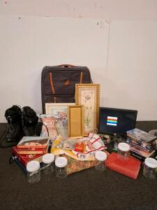DELL Monitor, (powered on) ski boots, Nautica Rolling Suitcase, 8 VHS/DVD Movies, 5 Books, Candles, Glass Jars, Silica Gel Crystals ( shelves A and B)