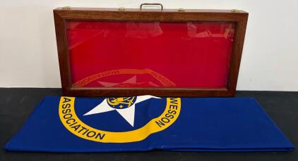 Large Wooden Display Case with Glass Top, Red Felt Interior, and Smith & Wesson Association Tablecloth