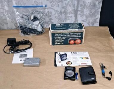 (1) Rio Mp3 Player, (1) GoDvd CT-200 Digital Video Enhancer & Duplicator, (1) VHS / Audio Tape Eraser & Assorted Electronic Cables