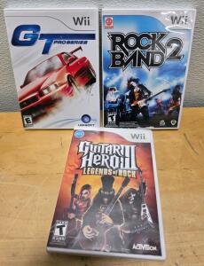Wii Game Lot: Rock Band 2, Guitar Hero III: Legends of Rock, GT Pro Series - With Cases