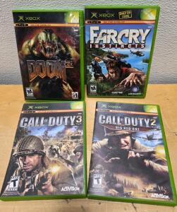 Original Xbox Game Lot: Call of Duty 2 Big Red One, Call of Duty 3, Far Cry Instincts, Doom 3