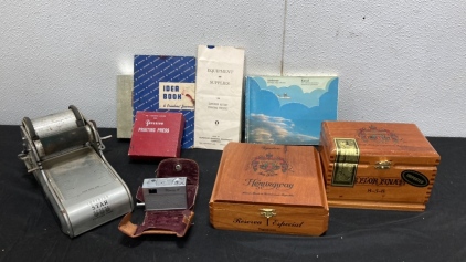 Micro 16 Camera, Superior Star Rotary Printing Press w/ ink and assesories, Cigar boxes and Airborne Heritage stamp book.