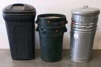 (7)Assorted 32-Gallon Trash Cans: Steel, Plastic, and Fiber Barrels with Lids