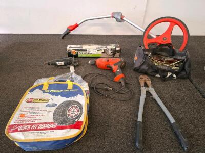 Lufkin Measuring Wheel &ndash; Large Wheel, Counter, Manual Operation, 40" Length, Lightweight Design, handle had duct tape on it. Bolt cutters, two tire chains, drill, Dremmel, and tire Inflator. All powerered on.