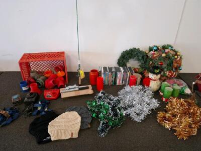 Mixed lot. Crate full of plumbing peices. Dvds, battery chargers for power tool batteries. Unable to test. Christmas decorations. ( shelf G)