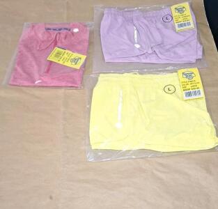 (2) Pair Of Banana Boat UPF 50+ Ladies Activewear Shorts, (1) Lavender, (1) Soft Yellow, Both Large & (1) Banana Boat UPF 50+ Ladies Rash Guard Top, Space Fushia, Large