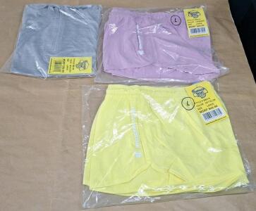 (2) Pair Of Banana Boat UPF 50+ Ladies Activewear Shorts, (1) Lavender, (1) Soft Yellow, Both Large & (1) Banana Boat UPF 50+ Ladies Rash Guard Top, Space Grey, Large