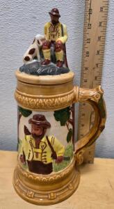 Vintage Ceramic Beer Stein with Figural Hunter Lid and Antler Painted Handle