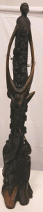 Hand-Carved African Wooden Sculpture Depicting Multiple Human Faces and Figures