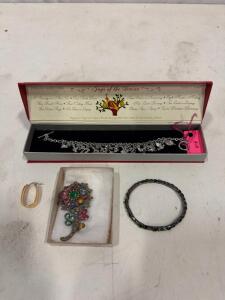 Costume Jewelry Lot: Silver Finish Necklace, Floral Rhinestone Brooch, Bracelet