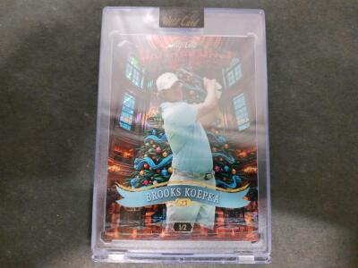 Brooks Koepka Wild Card Holiday Hits Golf Trading Card 2023, HHE1-BK, Serial Number 1/2, Rare