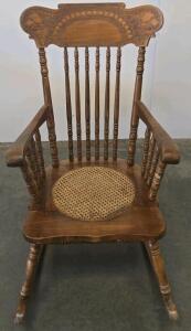 Ornately Carved Oak Rocking Chair, Cane Seat, Animal Head Backrest, 42&rdquo; Tall, Circa 1900