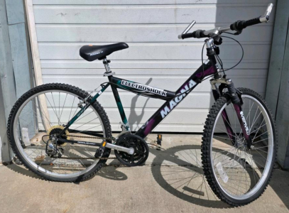 Magna Electroshock Mountain Bike 26", Front Suspension, 18-Speed, Steel Frame, Black/Purple/Green