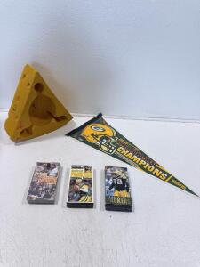 Green Bay Packers Memorabilia Lot: Foamation Cheesehead Hat, Super Bowl XXXI Pennant, Sealed VHS Tapes