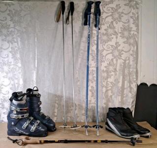 (1) Pair Of Salomon Ski Boots, Size 14 Men's, (1) Pair Of Salomon Cross Country Ski Boots, Size 11 Men's, (2) Sets Of Ski Poles & (1) Folding Walking Cane
