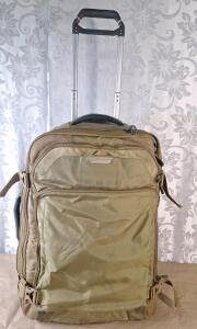 (1) Briggs & Riley Large Rolling Suitcase Filled W/ Assorted Hand Bags, Wallets & Makeup Bags