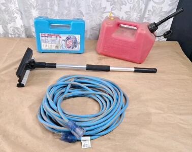 (1) 50-Foot Heavy Duty Extension Cord, (1) Squeegee, (1) 2.5-Gallon Gas Can & (1) Set Of Tire Chains