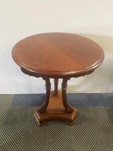 Hand-Carved Wooden Accent Table with Ornate Legs and Decorative Motifs