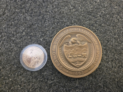 Idaho Territorial Centennial Silver Medal (1963) & Abraham Lincoln Presidential $1 Coin (2010)
