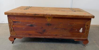Antique Cedar Chest With Casters, Hinged Lid, And Lock Mechanism