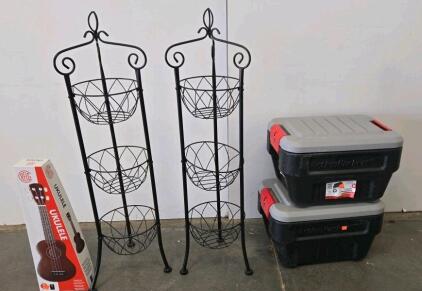 Set Of 2 Black 3-Tier Metal Basket Stands, 2 Rubbermaid ActionPacker 8 Gal Totes, And REIG Toy Ukulele