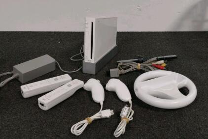 Nintendo Wii RVL-001 Console Bundle with 2 Remotes, 2 Nunchuks, Wheel, Accessories (powers on)