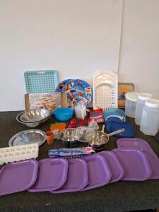 Large kitchen lot. Mixing bowls, plates, trays, sink dish drainer, measuring cups, cooling racks and more ( shelf L)