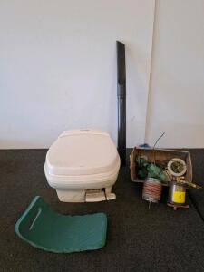 Thetford Porta Potti 135 Portable Toilet, 3 Gal Fresh/2.6 Gal Waste Capacity. Plumbing parts, knee pad and more. ( shelf A)