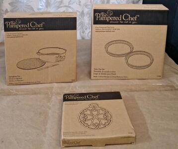 (1) Pampered Chef Springform Pan, Item #1542, (1) Pampered Chef Torte Pan Set, Item #1706 & (1) Pampered Chef Round-up From The Heart 2007 Cast Metal Trivet W/ Copper Top, Item #2938