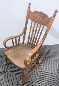 Antique Wooden Small Rocking Chair with Turned Spindles and Carved Crest