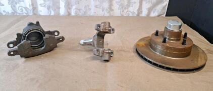Lot Of Assorted GM Parts, (1) Single Piston Brake Caliper, (1) Spindle, (1) Brake Rotor & More