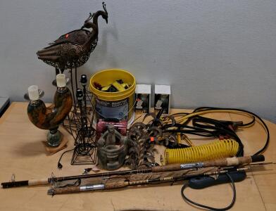 Assorted Household Items: Metal Peacock Sculpture, Fishing Rods, Rooftop Kit, Spider-Man Lunch Box