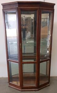 Corner Curio Cabinet With Glass Shelves, Mirrored Back, And Brass Latch