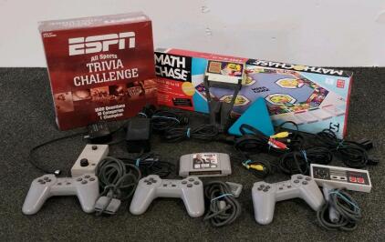 Vintage Video Game Lot: Game Genie NES, PlayStation Controllers, Madden 99, Sealed ESPN Trivia